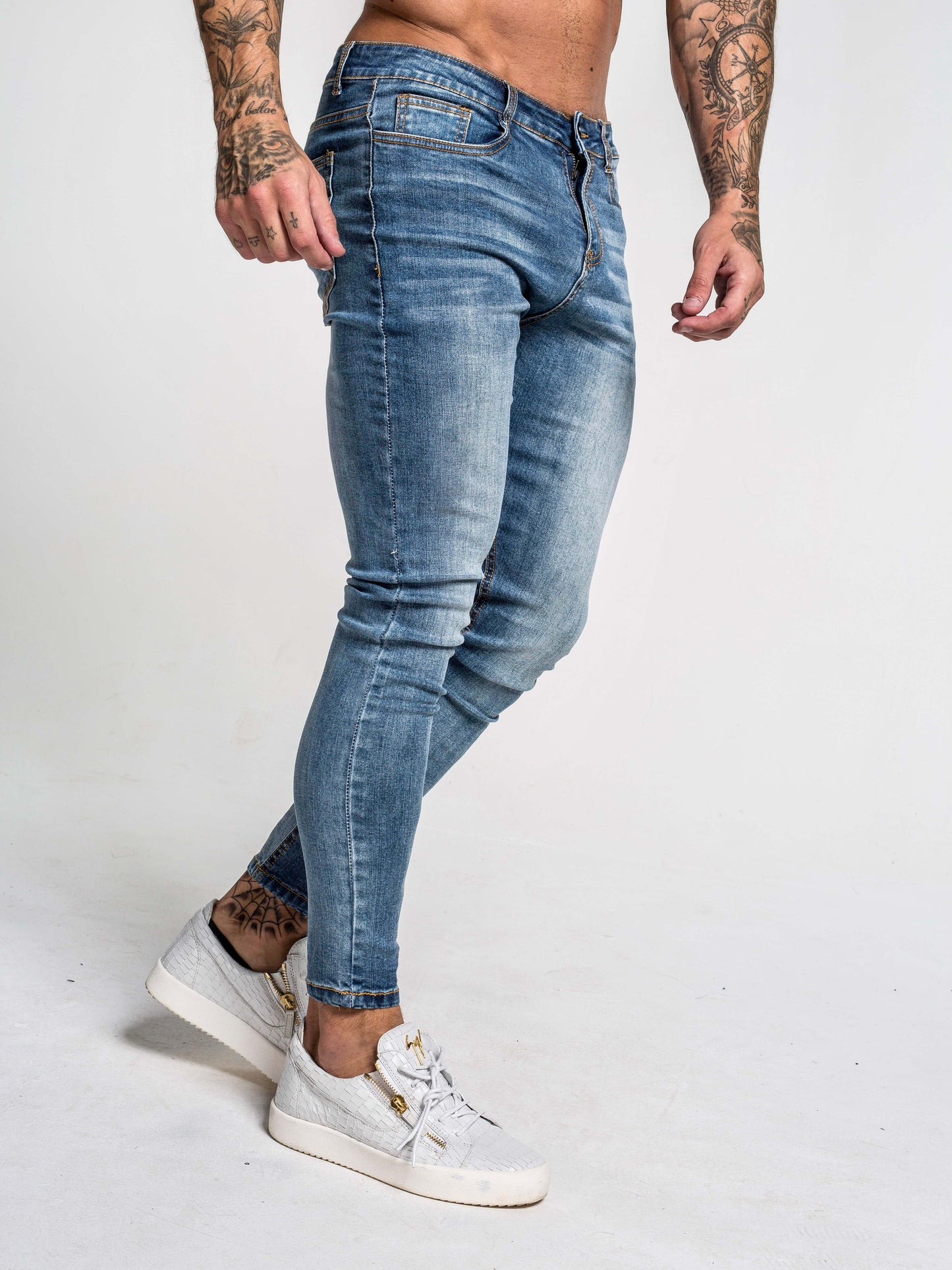 Stylish Michèllo jeans trousers and shorts in various sizes, colors, and styles for men, including class, ripped designs, and summer shorts.