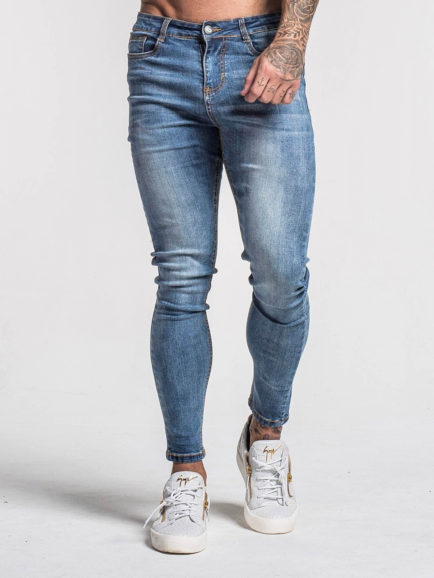 Stylish Michèllo jeans trousers and shorts in various sizes, colors, and styles for men, including class, ripped designs, and summer shorts.