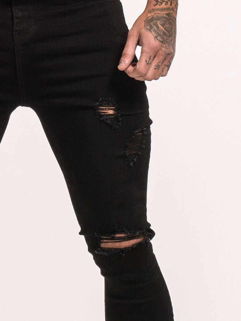 Stylish Michèllo jeans trousers and shorts in various sizes, colors, and styles for men, including class, ripped designs, and summer shorts.