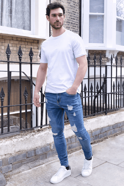 Stylish Michèllo jeans trousers and shorts in various sizes, colors, and styles for men, including class, ripped designs, and summer shorts.