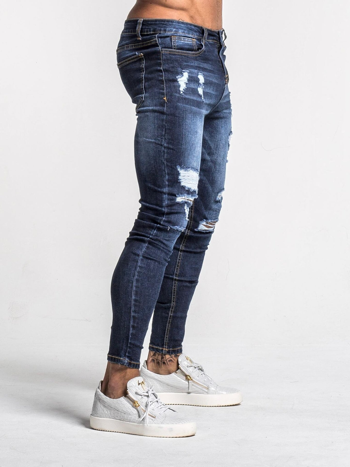 Stylish Michèllo jeans trousers and shorts in various sizes, colors, and styles for men, including class, ripped designs, and summer shorts.
