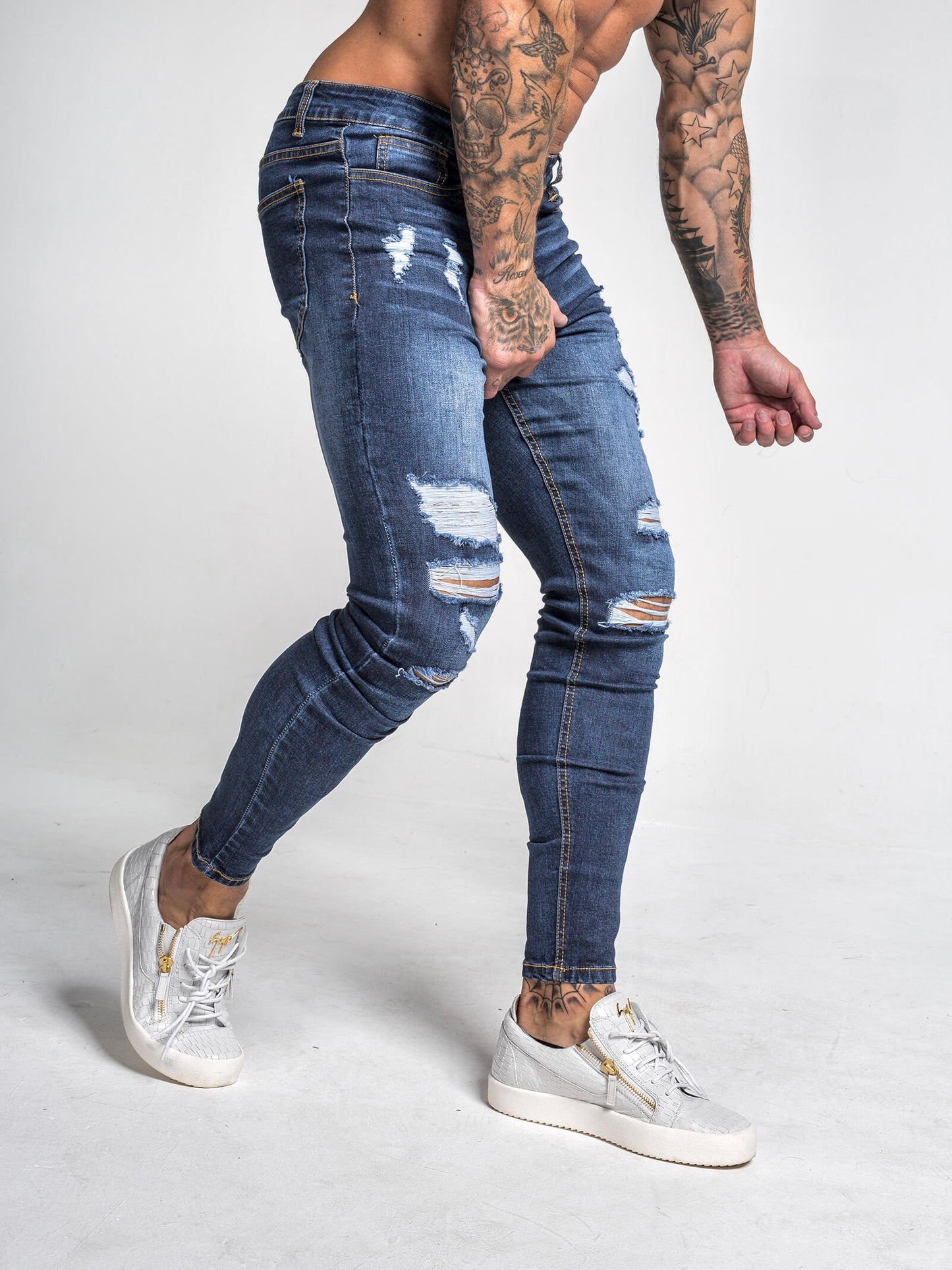 Stylish Michèllo jeans trousers and shorts in various sizes, colors, and styles for men, including class, ripped designs, and summer shorts.