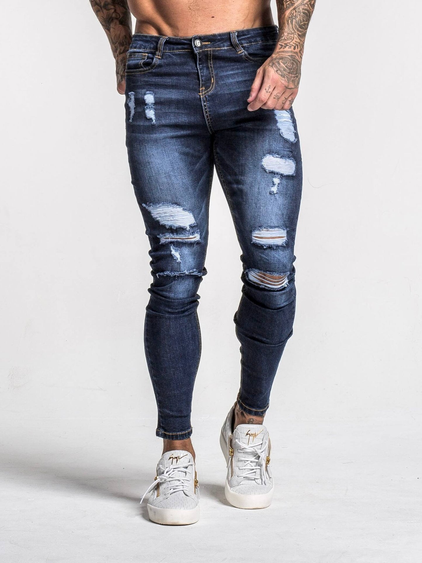 Stylish Michèllo jeans trousers and shorts in various sizes, colors, and styles for men, including class, ripped designs, and summer shorts.