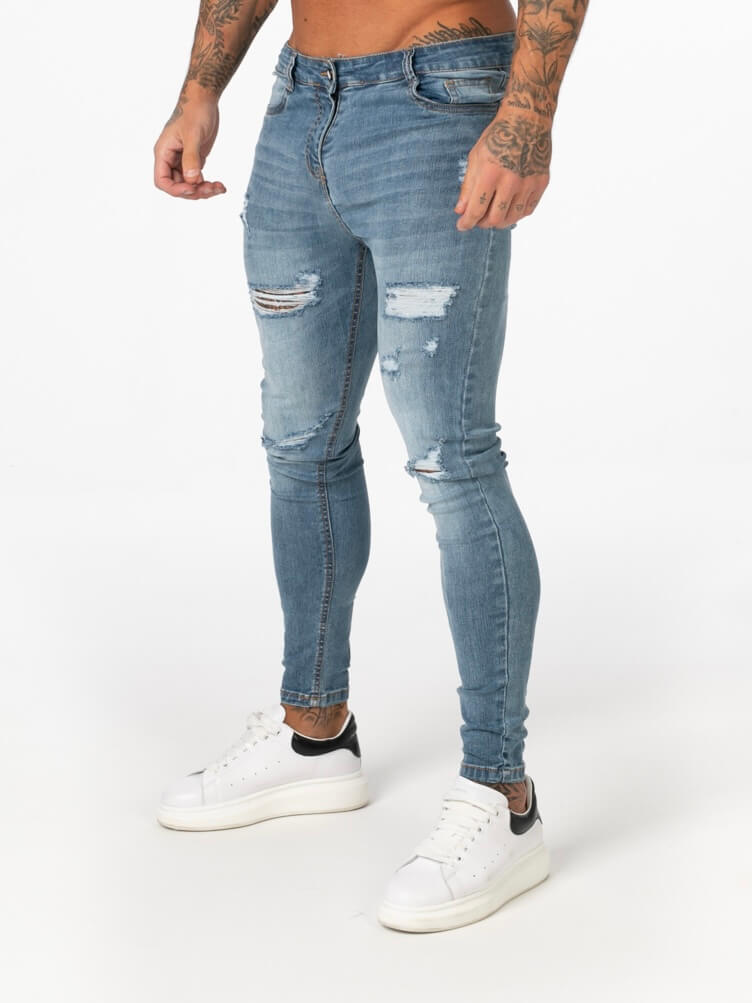 Stylish Michèllo jeans trousers and shorts in various sizes, colors, and styles for men, including class, ripped designs, and summer shorts.