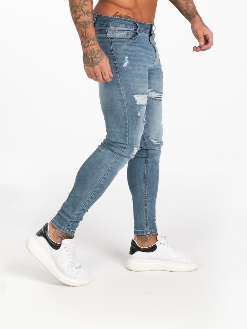 Stylish Michèllo jeans trousers and shorts in various sizes, colors, and styles for men, including class, ripped designs, and summer shorts.