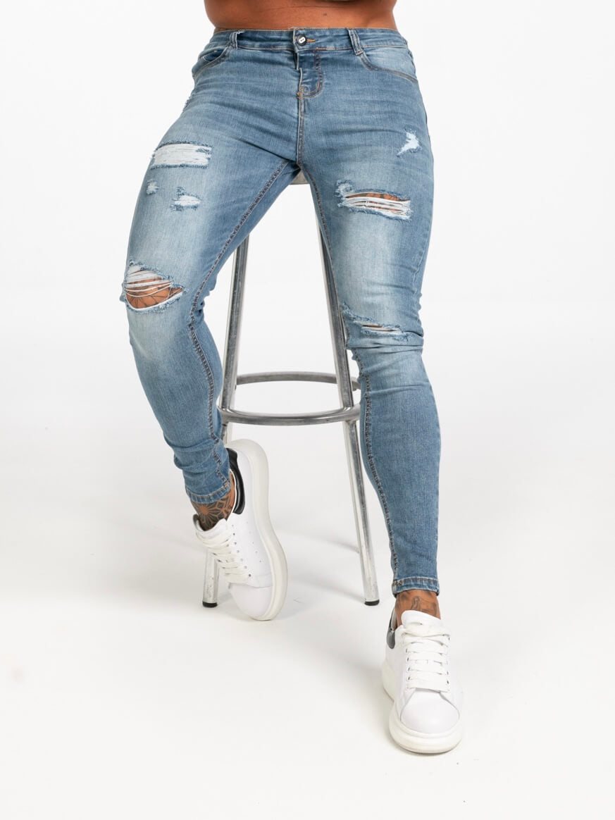 Stylish Michèllo jeans trousers and shorts in various sizes, colors, and styles for men, including class, ripped designs, and summer shorts.