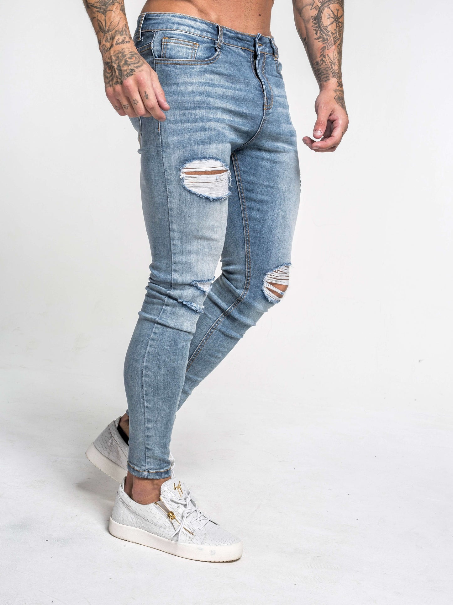 Stylish Michèllo jeans trousers and shorts in various sizes, colors, and styles for men, including class, ripped designs, and summer shorts.