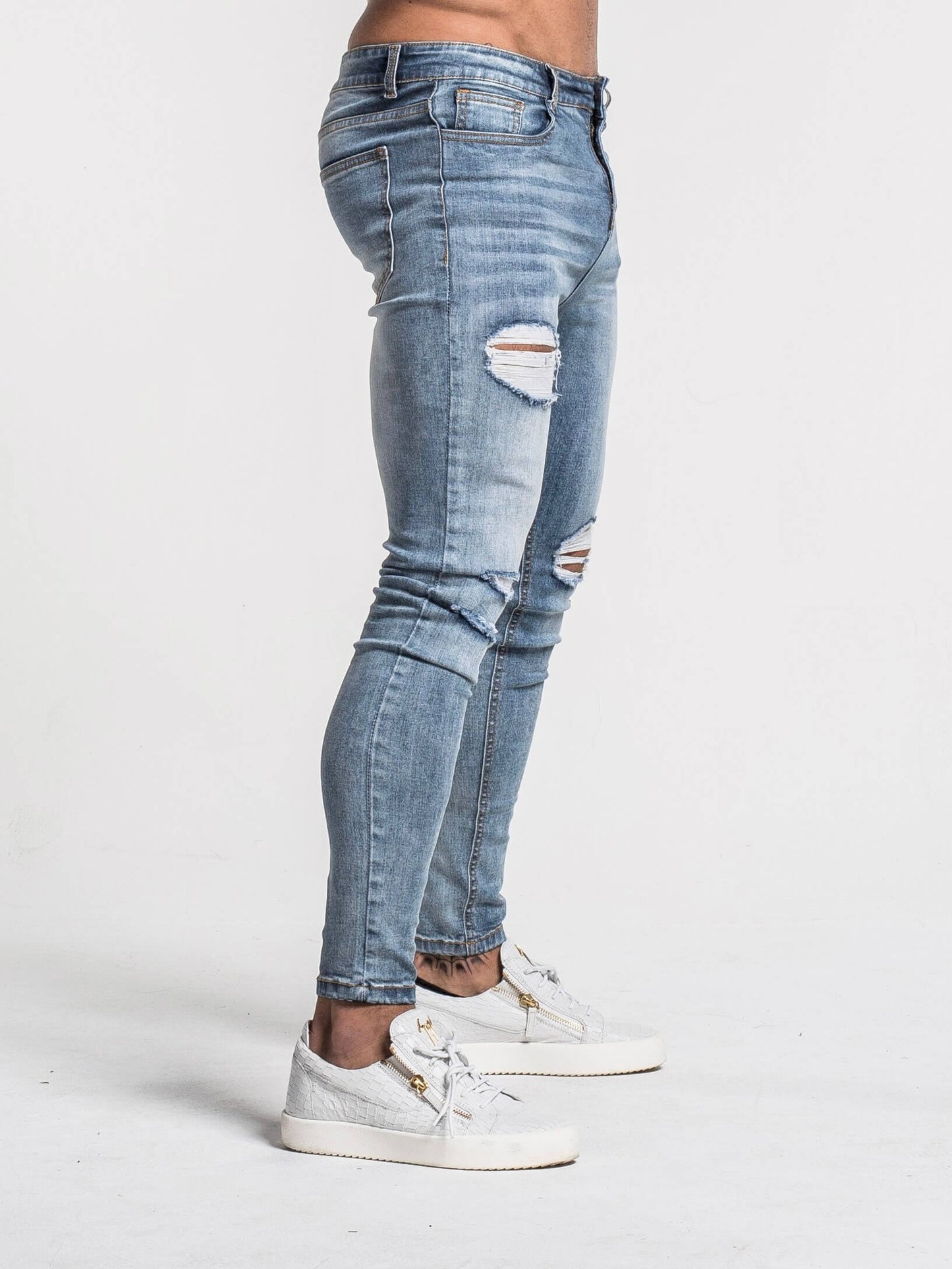 Stylish Michèllo jeans trousers and shorts in various sizes, colors, and styles for men, including class, ripped designs, and summer shorts.