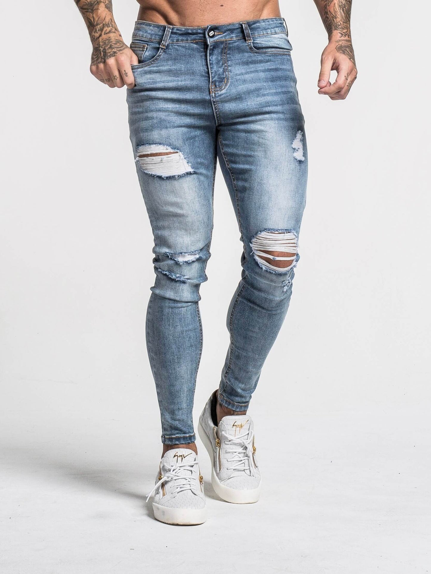 Stylish Michèllo jeans trousers and shorts in various sizes, colors, and styles for men, including class, ripped designs, and summer shorts.